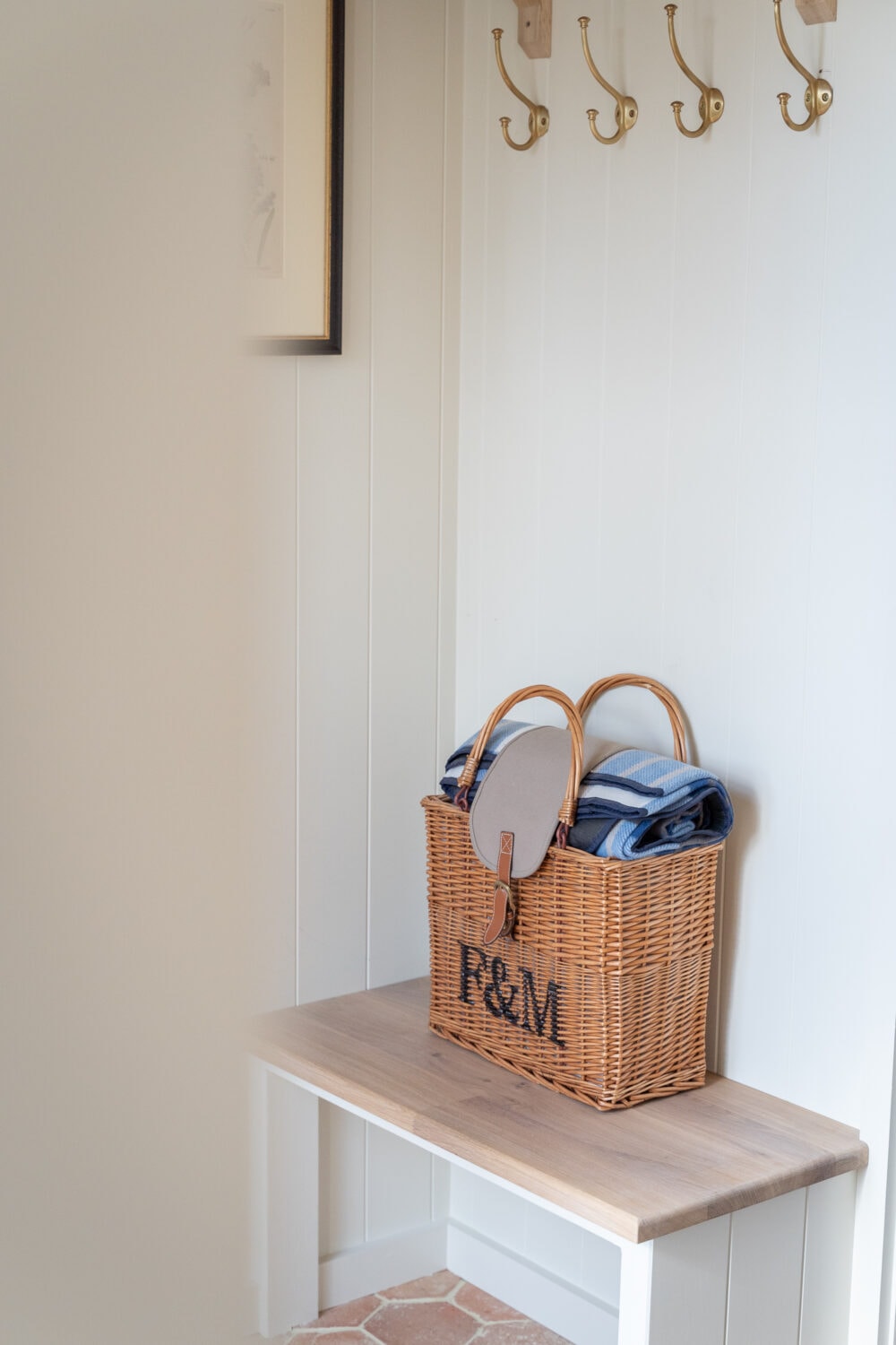 A detail image of a Fortnum and Mason Basket in the cloakroom of a Berkshire AirBnB
