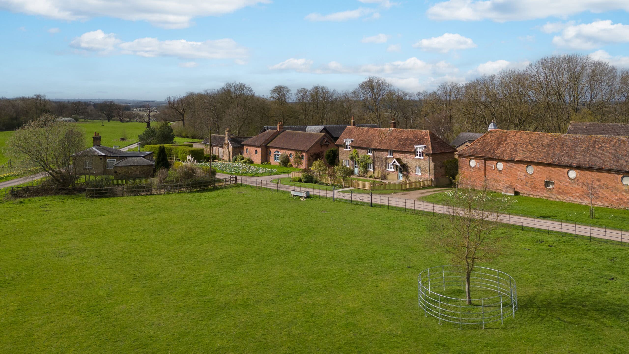 Aerial drone photo of a character holiday cottage located in a country estate
