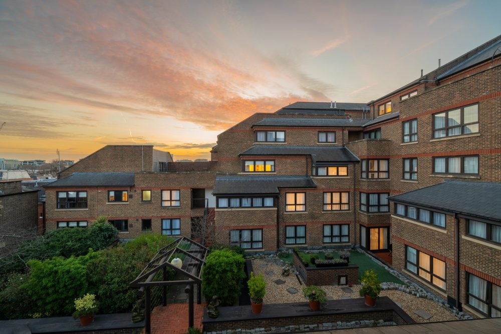 Sunset exterior of luxury serviced apartment building in Kensington and Chelsea, London