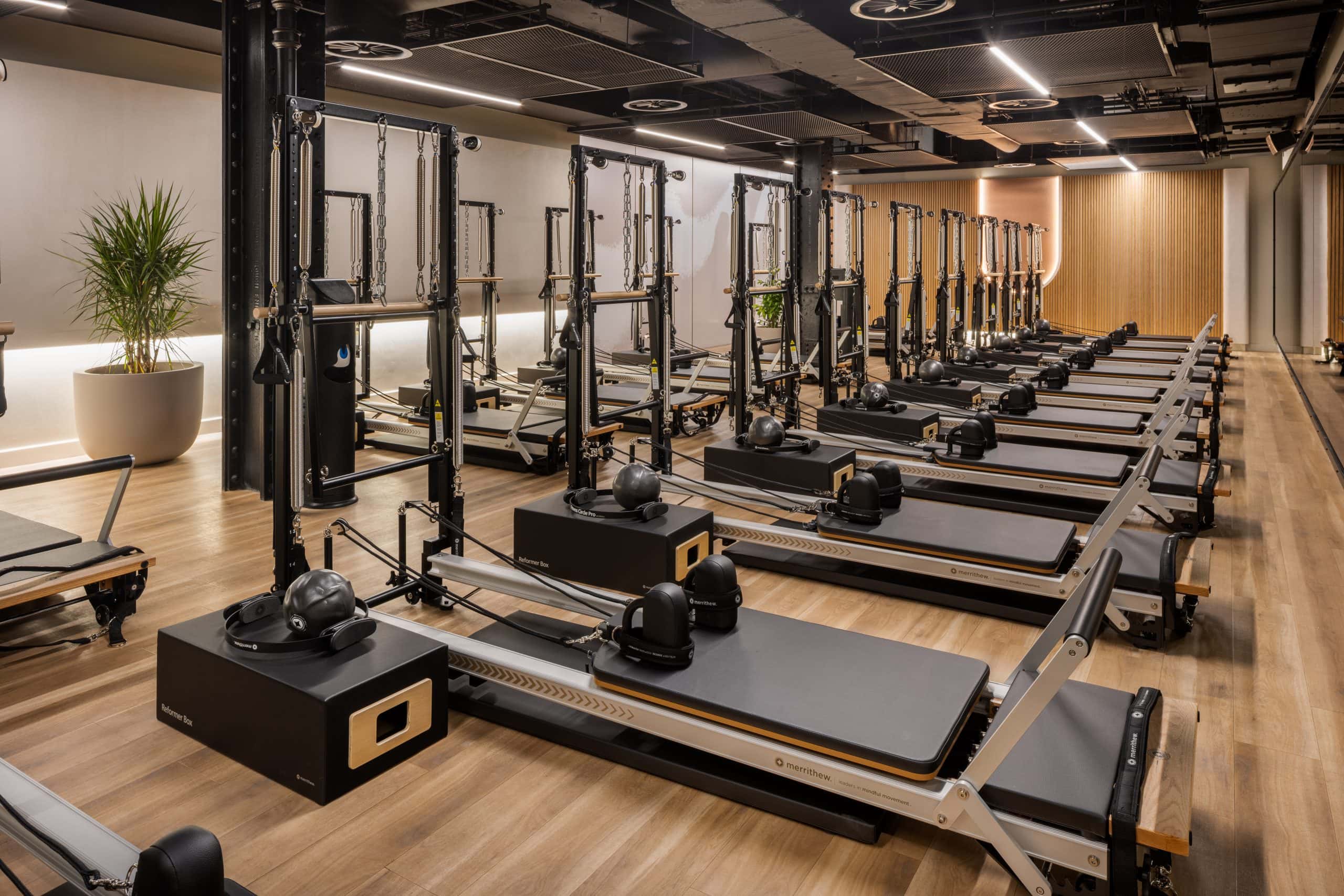 Luxury gym with group weight training area